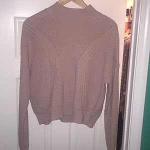 Pink knitted sweater